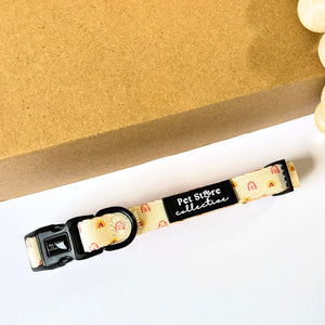 Boho Rainbow Fully adjustable Dog Collar with neoprene padding for comfort. Shown on white background with warm rainbow pattern, designed in Australia and perfect for small to large dogs.