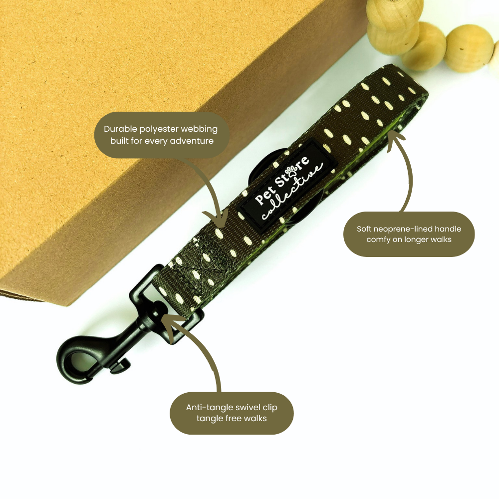 Dottie Days olive green anti-tangle dog lead showing soft neoprene handle durable polyester webbing and swivel clip by Pet Store Collective.