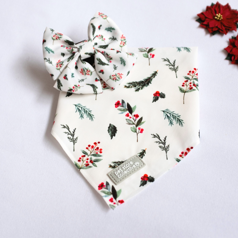 Celebrate the season with our Mistletoe Pet Bandana & Bow Tie Set, featuring festive red berries and green leaves on a crisp white background. Exclusive to Pet Store Collective. Bandana S/M (25-47cm neck), Bow Tie L 9cm x H 6cm.