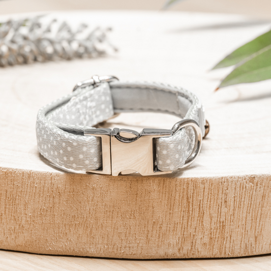 Our sage green Polka Safety Meow Cat Collar with white polka dots, adjustable fit (20 cm to 30 cm), safety release buckle, and D-ring for ID tags. Features a subtle light grey rectangle logo with white text from Pet Store Collective. Stylish, durable, and perfect for kittens and adult cats.