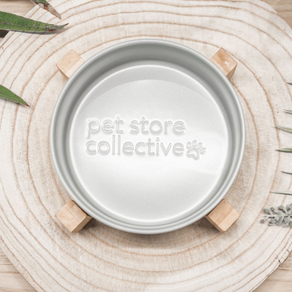 Top view of silver mist ceramic pet bowl with bamboo base showing interior capacity by Pet Store Collective.