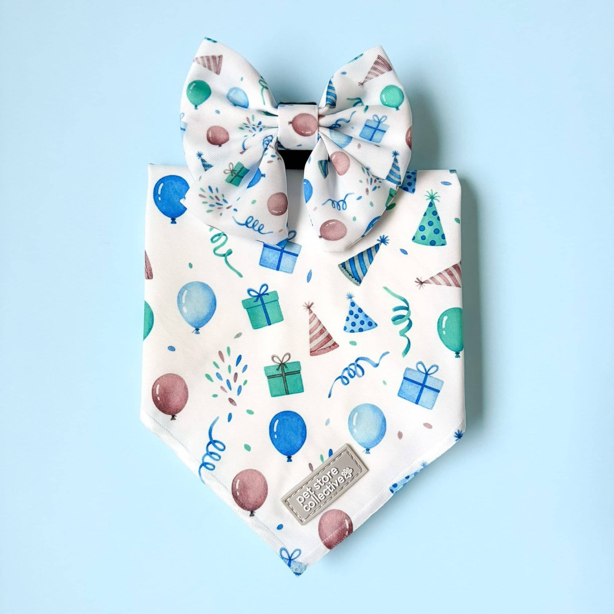 Birthday boy dog bandana and matching bowtie. Fits small-to-medium dogs and cats, classic tie-up bandana and bowtie that attaches with velcro backing.
