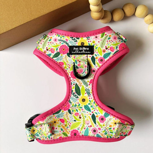 Top view of our Bloom Floral Adjustable Dog Harness in blush pink roses and soft greenery design. Crafted from lightweight quick-dry neoprene with padded edges, featuring both front and back D-rings for training and everyday walks, available in XXS to Large.