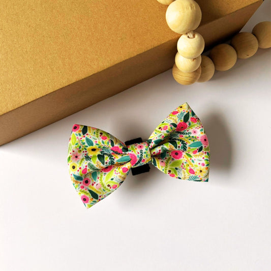 Top view of our large Bloom Floral Dog Bowtie in blush pink roses and green leaf print. Features a secure velcro fastening to attach to any dog collar, made from lightweight polyester webbing for everyday comfort.