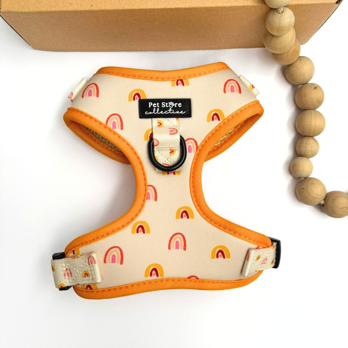 Our Boho Rainbow Adjustable Dog Harness in vibrant yellow and cream with rainbow pattern. Stylish dog accessories Australia, lightweight quick-dry neoprene, designed in Sydney.