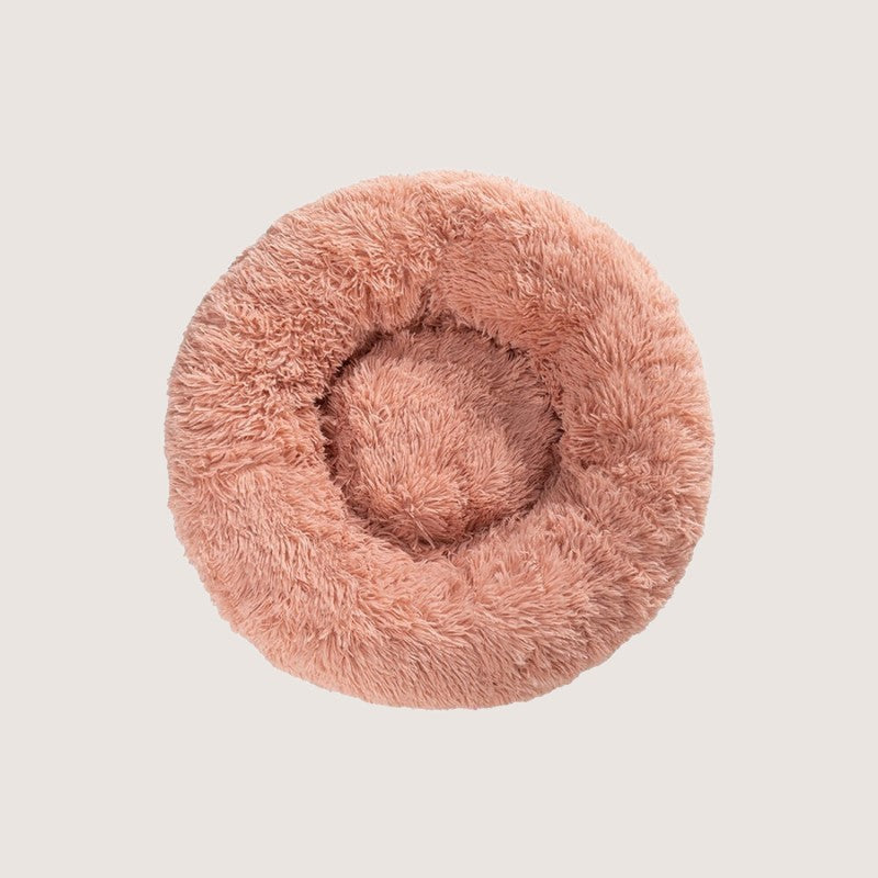 Cotton Candy Calming Donut Pet Bed: Experience ultimate pet comfort with our best-selling dog bed. Embrace security with its circular design for a sense of cosiness and warmth. Raised edges provide neck and body support. Crafted from plush materials for extra softness and easy machine washable maintenance.