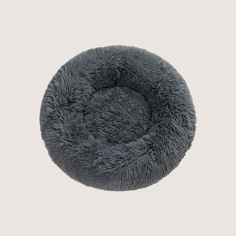 Dark Grey Calming Donut Pet Bed: Experience ultimate pet comfort with our best-selling dog bed. Embrace security with its circular design for a sense of cosiness and warmth. Raised edges provide neck and body support. Crafted from plush materials for extra softness and easy machine washable maintenance.