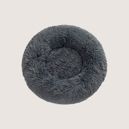 Dark Grey Calming Donut Pet Bed: Experience ultimate pet comfort with our best-selling dog bed. Embrace security with its circular design for a sense of cosiness and warmth. Raised edges provide neck and body support. Crafted from plush materials for extra softness and easy machine washable maintenance.