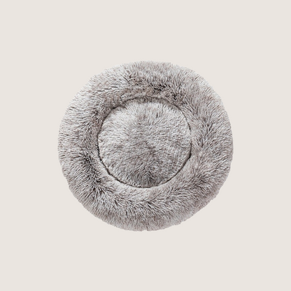 Silver Grey Calming Donut Pet Bed: Experience ultimate pet comfort with our best-selling dog bed. Embrace security with its circular design for a sense of cosiness and warmth. Raised edges provide neck and body support. Crafted from plush materials for extra softness and easy machine washable maintenance.