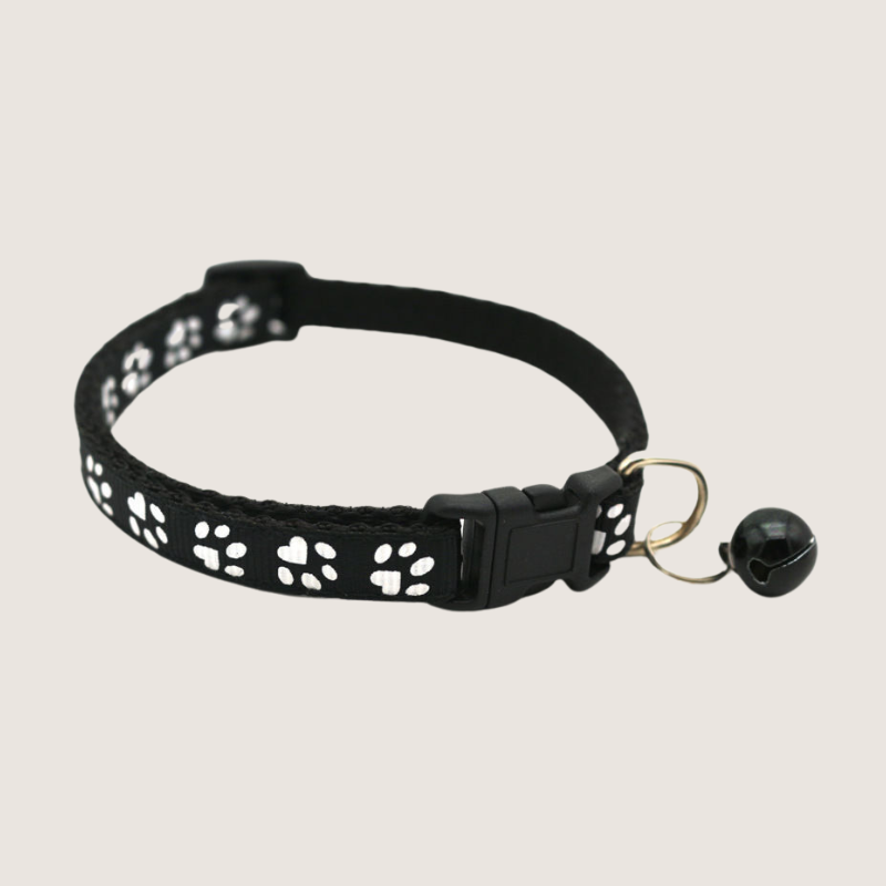 Black Colour: Give your pet's style a boost with our cute paw print collars! Available in 12 vibrant colours, each collar comes with an attached bell for extra charm and is super easy to adjust. Shop now to add some flair to your furry friend's look!
