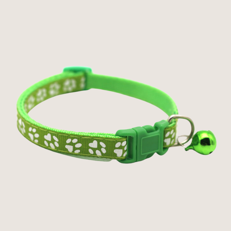 Grass Green Colour: Give your pet's style a boost with our cute paw print collars! Available in 12 vibrant colours, each collar comes with an attached bell for extra charm and is super easy to adjust. Shop now to add some flair to your furry friend's look!