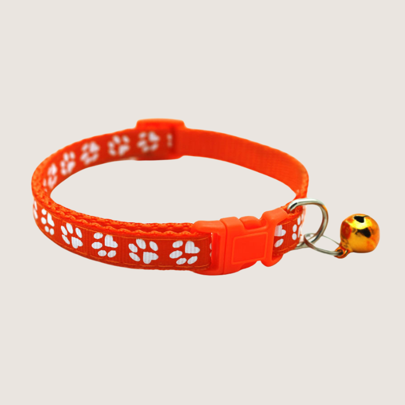 Orange Colour: Give your pet's style a boost with our cute paw print collars! Available in 12 vibrant colours, each collar comes with an attached bell for extra charm and is super easy to adjust. Shop now to add some flair to your furry friend's look!