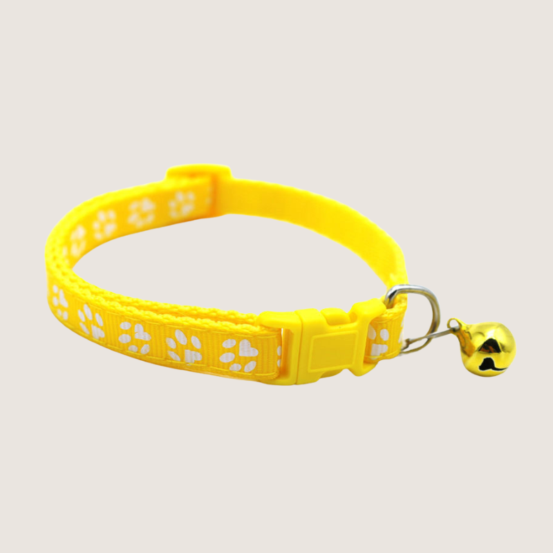 Yellow Colour: Give your pet's style a boost with our cute paw print collars! Available in 12 vibrant colours, each collar comes with an attached bell for extra charm and is super easy to adjust. Shop now to add some flair to your furry friend's look!