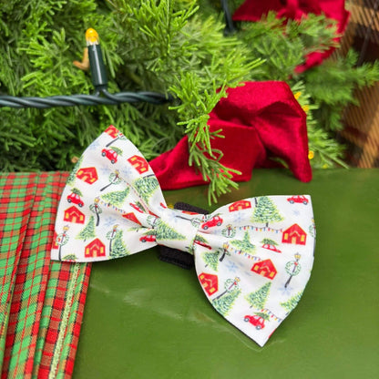 Front angled view of our limited release Christmas Magic Bow Tie. Showing its soft festive fabric and secure velcro backing that easily fits any collar. The perfect touch of Christmas charm for cats and dogs.