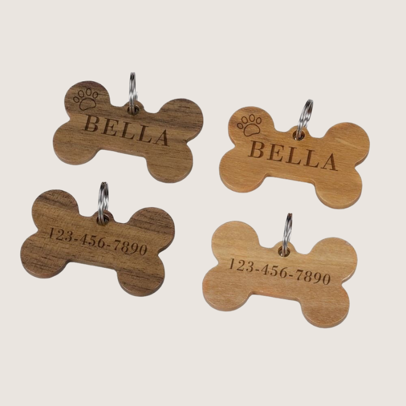 Dark and Light Wood Pet ID Tags: Unique, personalised wooden identification tags, essential for pet safety. Each tag boasts a distinct pattern, available in light or dark wood. Enjoy free engraving and free shipping across Australia, USA, UK, and Germany. Size: Height: 0.98 inch x Width: 1.57 inch.