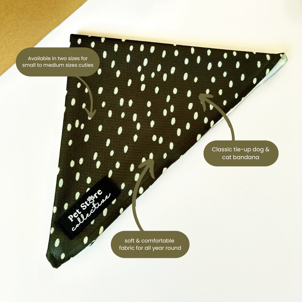 Dottie Days olive green dog bandana showing classic tie-up design and soft cream polka dot print by Pet Store Collective. Available in two sizes for small-to-medium size dogs and cats.