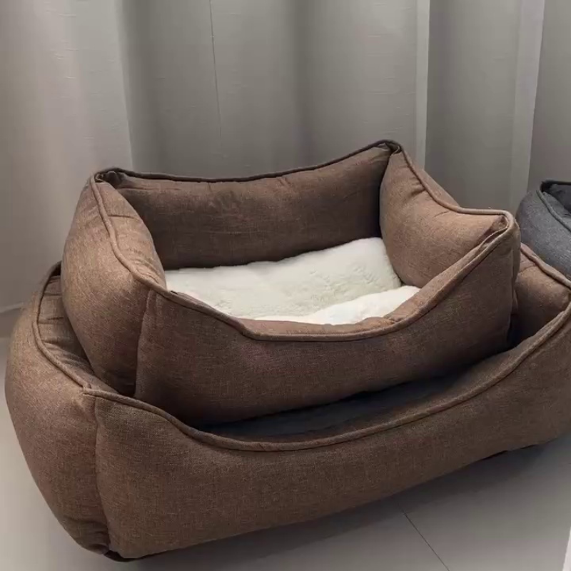 Our small and large brown pet beds displayed, showcasing elevated edges and soft cotton lining for ultimate comfort. Ideal for pets of all sizes to enjoy a cosy and supportive rest.