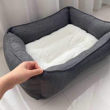 Our grey pet bed offers soft cotton lining and elevated edges for added comfort and support. The anti-slip base ensures stability, making it an ideal choice for your pet’s restful sleep.