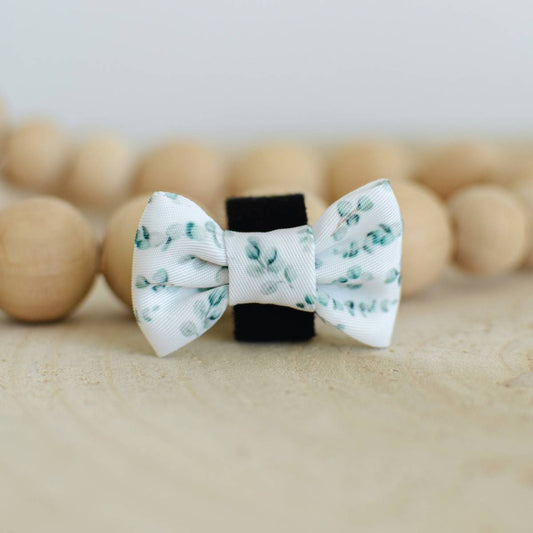 Our sage green white polka dot cat bow tie, 4.5cm length and 3cm height, with velcro attachment. Lightweight, stylish, and exclusive to Pet Store Collective.