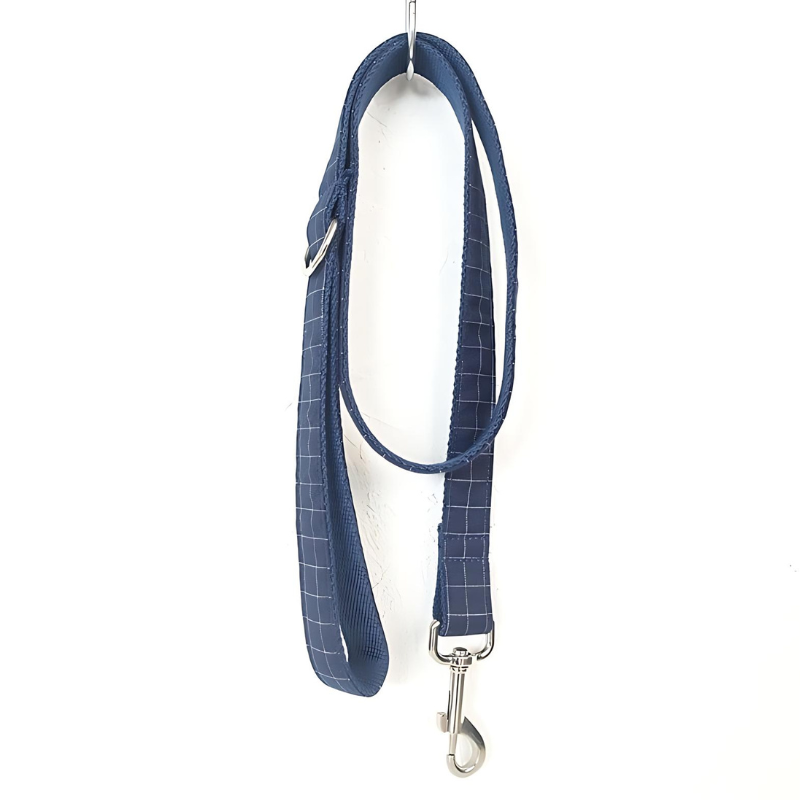 Take stylish walks with our Navy Gingham Dog Lead. Made from lightweight polyester and featuring a 360° swivel anti-tangle design, it boasts durable metal alloy hardware for strength and durability.