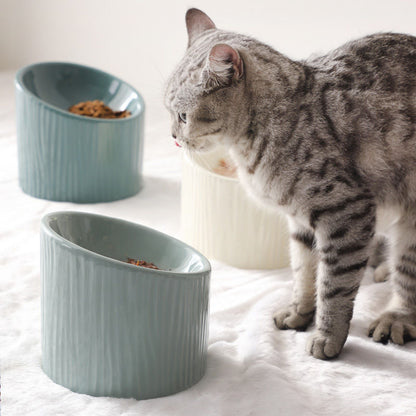 Nature-themed ceramic pet bowls in light green, dark green, and off-white colors. Durable, chip-resistant, and antibacterial. Each bowl measures 15.5CM wide, 14.5CM back height, 10CM front height, with a capacity of 170ML.