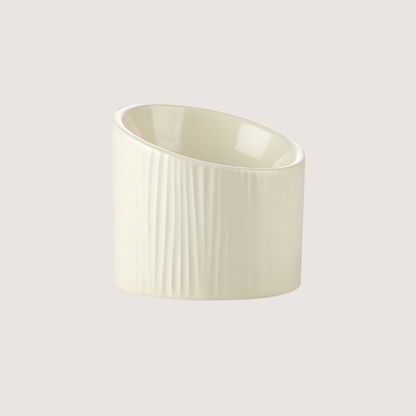 Off-white ceramic pet bowl with bark-like textures, dishwasher safe. Durable and antibacterial, 15.5CM wide, 14.5CM back height, 10CM front height, holds 170ML.