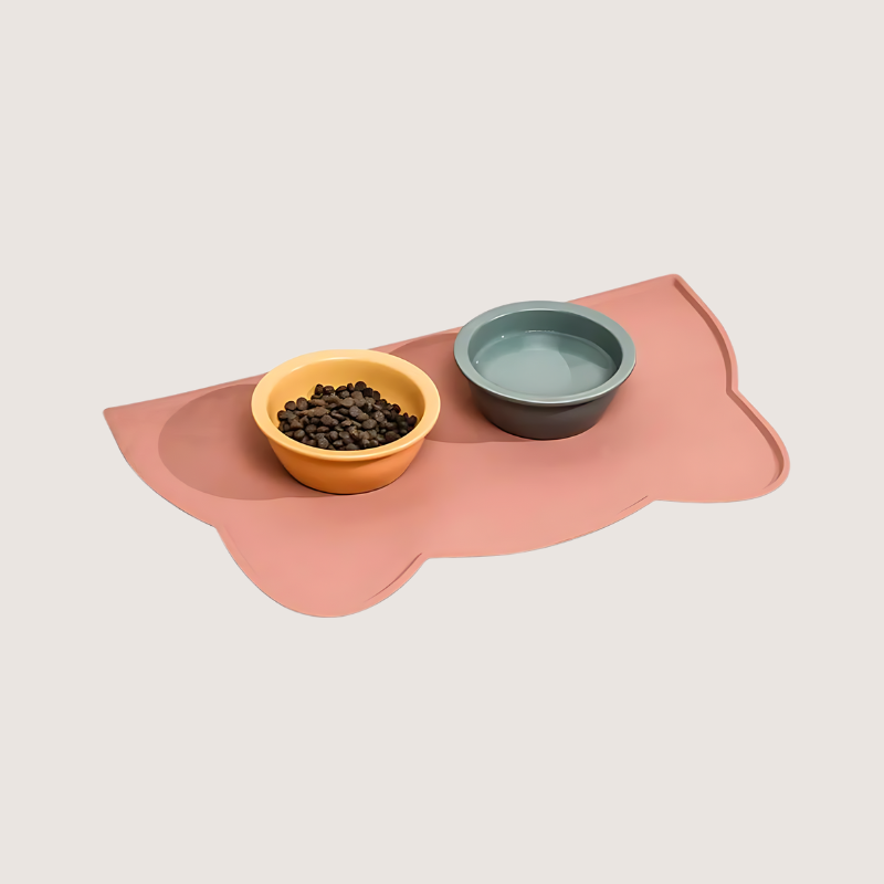 Pink ear-shaped waterproof silicone pet food mat, lightweight and easy to clean, perfect for a stylish and functional dining space.