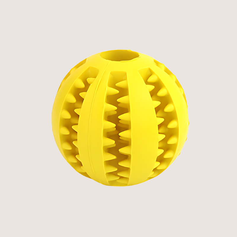 Yellow Interactive Treat Ball Toy: Say Goodbye to Plaque with our yellow interactive treat ball toy. Designed for dental care and engagement, it features soft spiked grooves that remove plaque and tartar. Available in two sizes: Small (S) with a 5CM circumference and Medium (M) with a 7CM circumference. A must-have for any playful pup.