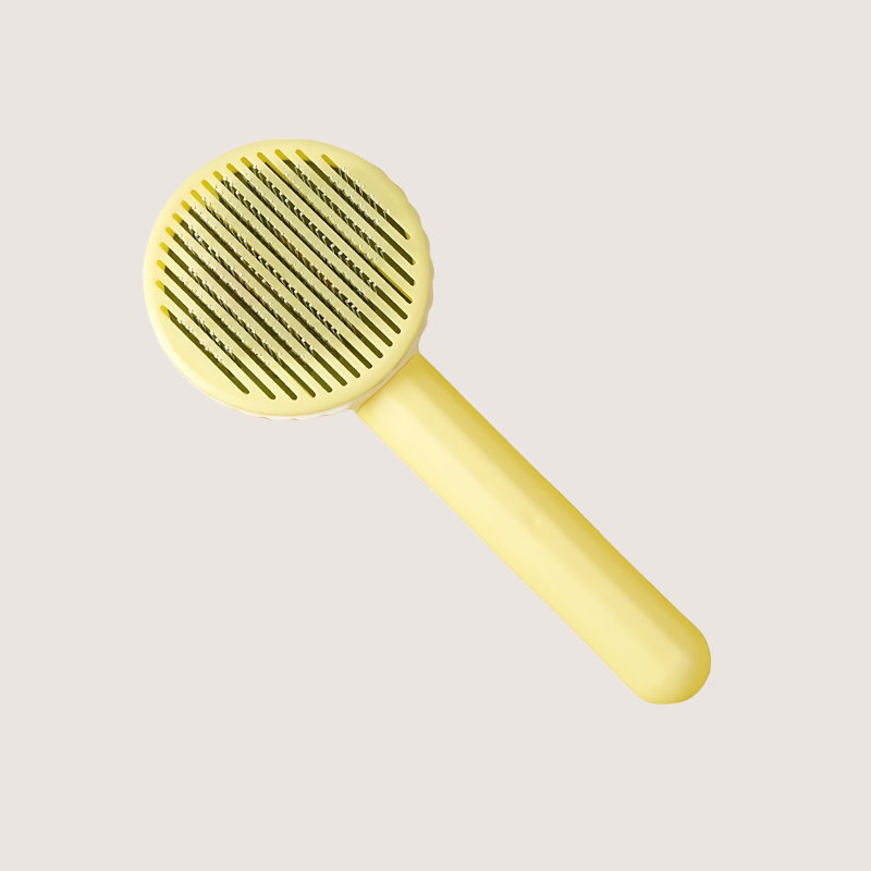 Yellow stainless-steel slicker brush, perfect for small to medium-sized pets. Features a non-slip handle and 60-degree bristles for effortless grooming and convenient hair release.