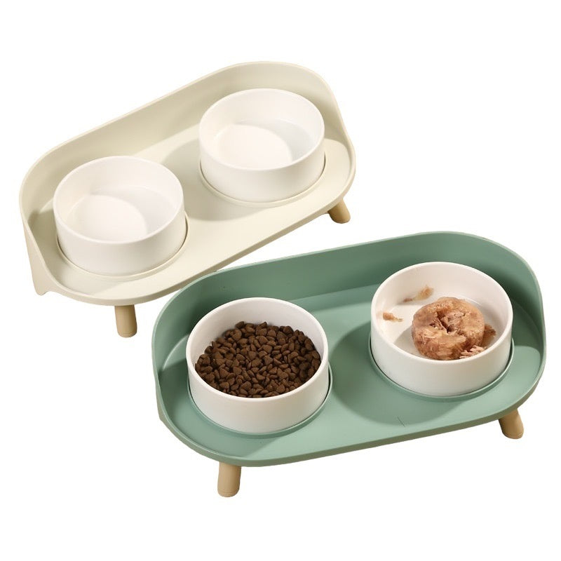 White & Green Colours: Stylish Double Pet Bowl Set: A must-have for pet owners! Neatly holds two bowls in place. Base catches food spillage for easy cleanup. Comfortable height for pets. Relieves pressure on neck and spine. Enhanced eating and drinking experience for your furry friend.