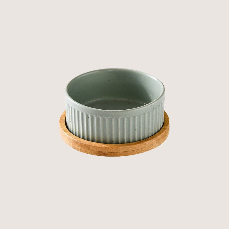 Light Green Single Bowl with Base: Stylish ceramic bowls with eco-friendly bamboo bases provide convenience and hygiene for your home. Available in single bowl with bamboo base, two bowls with base, three bowls with bamboo base, and single pet bowls on their own. Anti-slip bamboo bases prevent spills, while dishwasher-safe design simplifies cleanup. Elevate your pet's dining experience with these high-quality, antibacterial bowls, ensuring style and functionality in every meal.