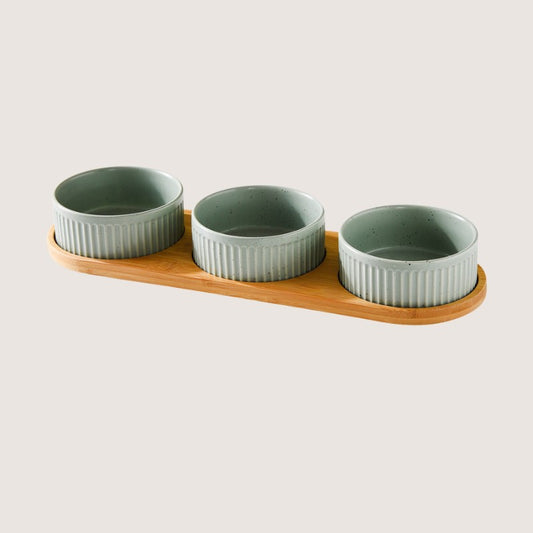 Light Green Three Bowls with Base: Stylish ceramic bowls with eco-friendly bamboo bases provide convenience and hygiene for your home. Available in single bowl with bamboo base, two bowls with base, three bowls with bamboo base, and single pet bowls on their own. Anti-slip bamboo bases prevent spills, while dishwasher-safe design simplifies cleanup. Elevate your pet's dining experience with these high-quality, antibacterial bowls, ensuring style and functionality in every meal.