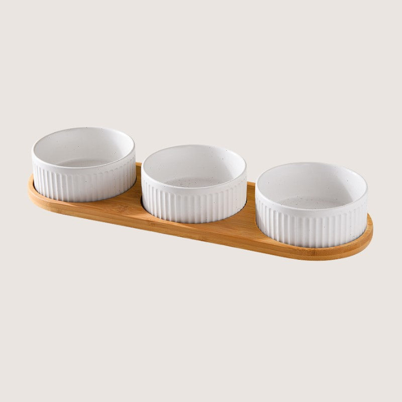 White Three Bowls with Base: Stylish ceramic bowls with eco-friendly bamboo bases provide convenience and hygiene for your home. Available in single bowl with bamboo base, two bowls with base, three bowls with bamboo base, and single pet bowls on their own. Anti-slip bamboo bases prevent spills, while dishwasher-safe design simplifies cleanup. Elevate your pet's dining experience with these high-quality, antibacterial bowls, ensuring style and functionality in every meal.
