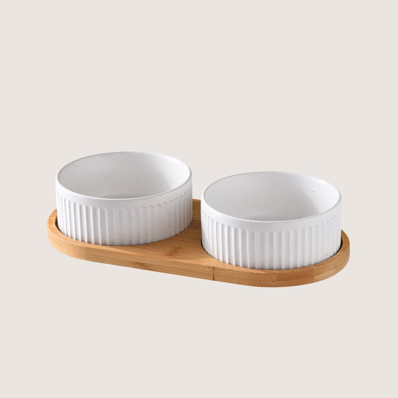 White Two Bowls with Base: Stylish ceramic bowls with eco-friendly bamboo bases provide convenience and hygiene for your home. Available in single bowl with bamboo base, two bowls with base, three bowls with bamboo base, and single pet bowls on their own. Anti-slip bamboo bases prevent spills, while dishwasher-safe design simplifies cleanup. Elevate your pet's dining experience with these high-quality, antibacterial bowls, ensuring style and functionality in every meal.